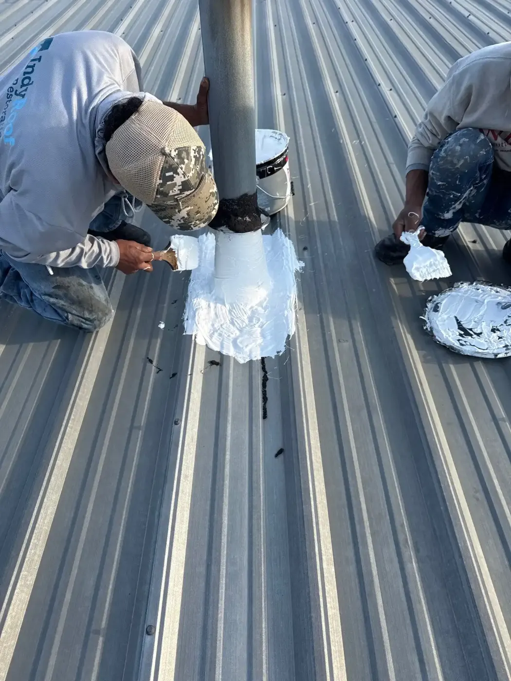 Tarping and dry-in on a Limestone Springs commercial roof